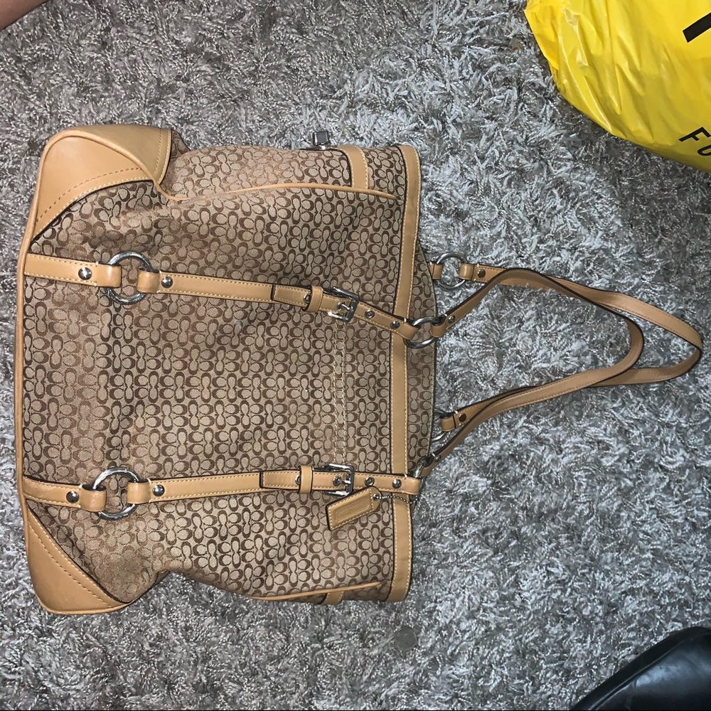 Tan and brown Coach Pocketbook